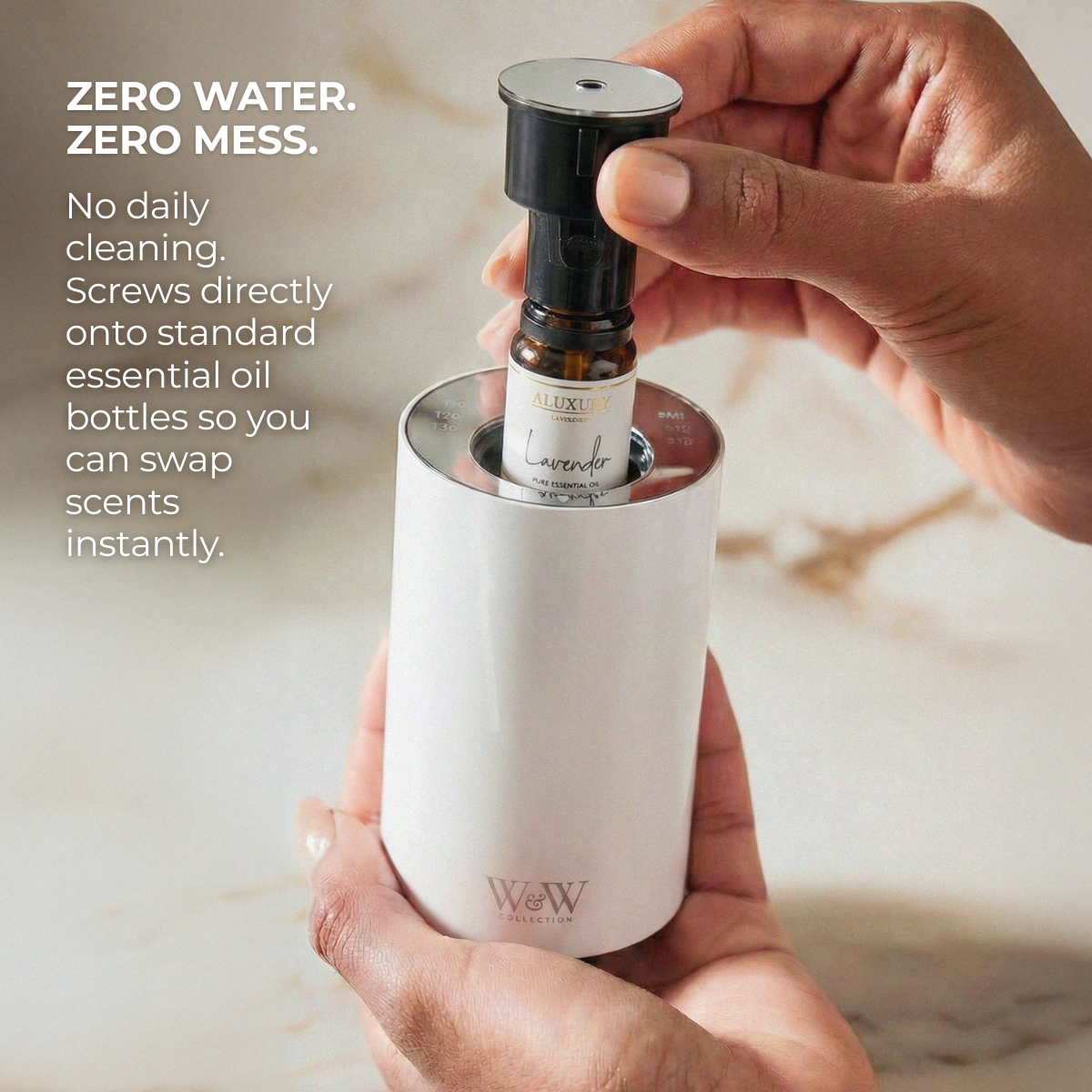 White Nebula diffuser with woman inserting cartridge with essential oil attached