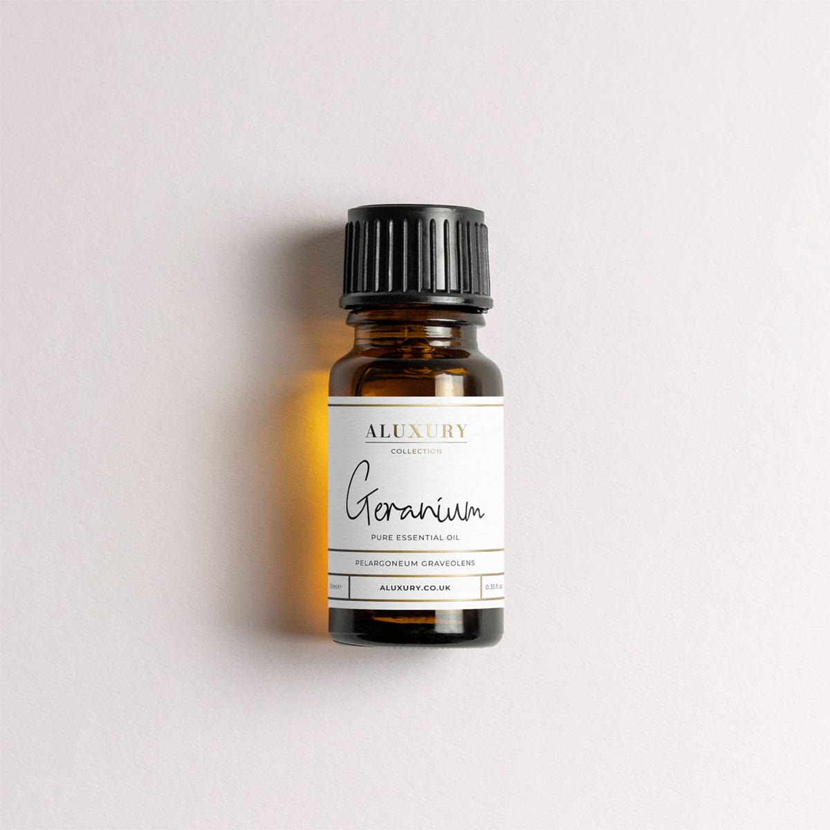 pure geranium essential oil bottle
