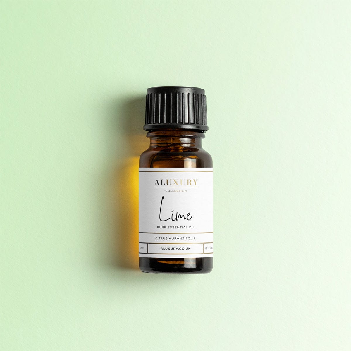 pure lime esssential oil bottle