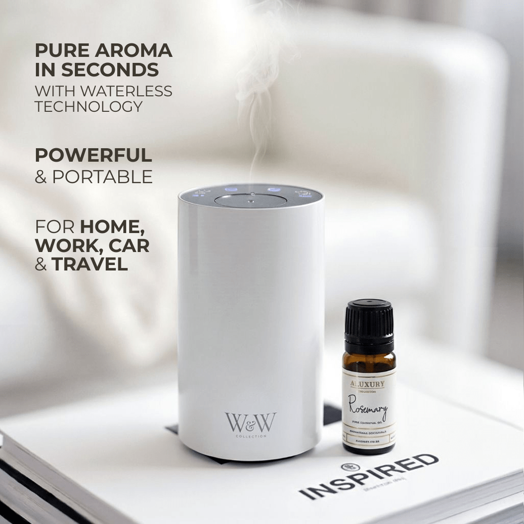 White portable waterless diffuser nebulizing with essential oil