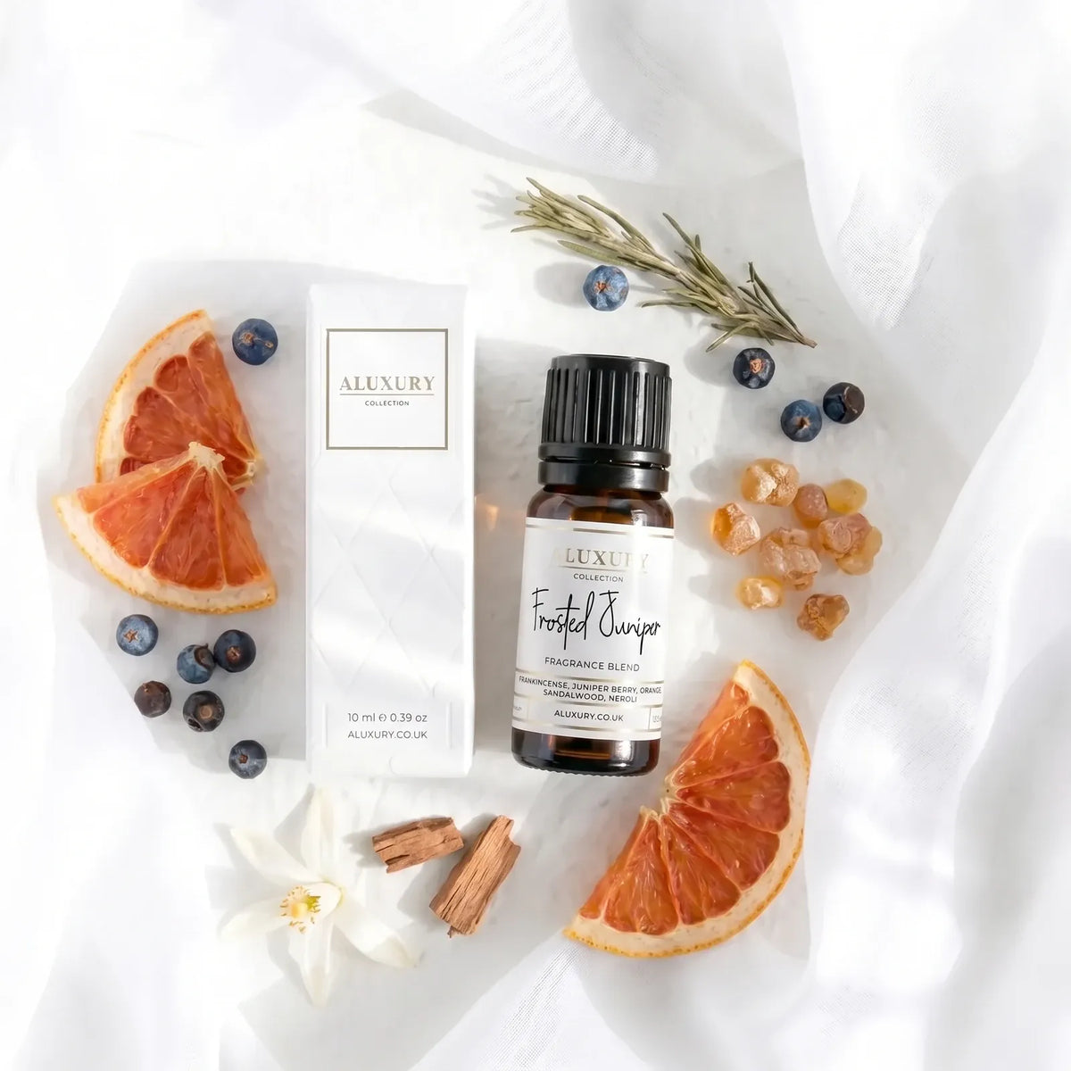 Frosted Juniper 10ml diffuser fragrance oil with juniper berries, frankincense, dried orange and sandalwood
